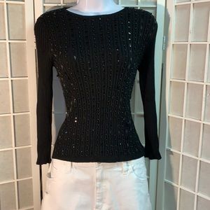 Black quarter length sleeve embellished sweater.